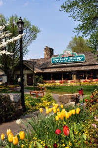 The Old Mill Pottery House Cafe and Grille in the spring with red and yellow tulips