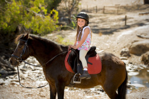 little girl horseback riding Pigeon Forge